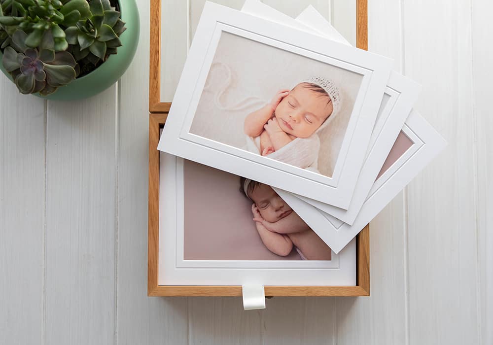Print box collection with matted portrait prints in a bamboo presentation box